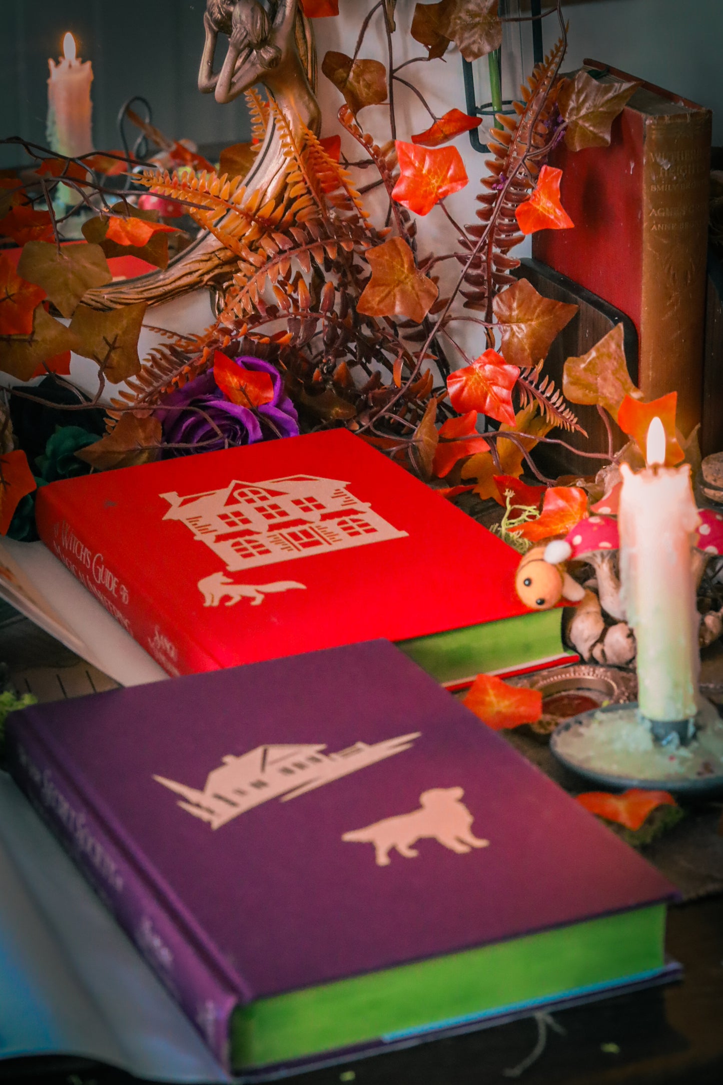 The Very Secret Society of Irregular Witches & A Witch's Guide to Magical Inkeeping hand-painted book edges - books by Sangu Mandana