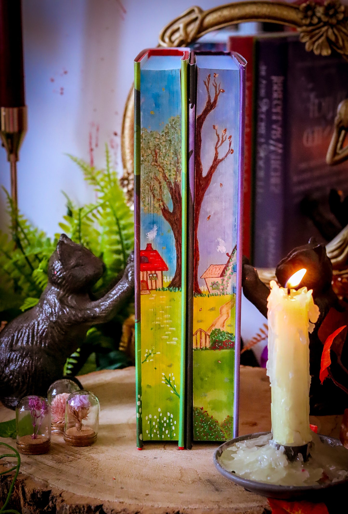 The Very Secret Society of Irregular Witches & A Witch's Guide to Magical Inkeeping hand-painted book edges - books by Sangu Mandana