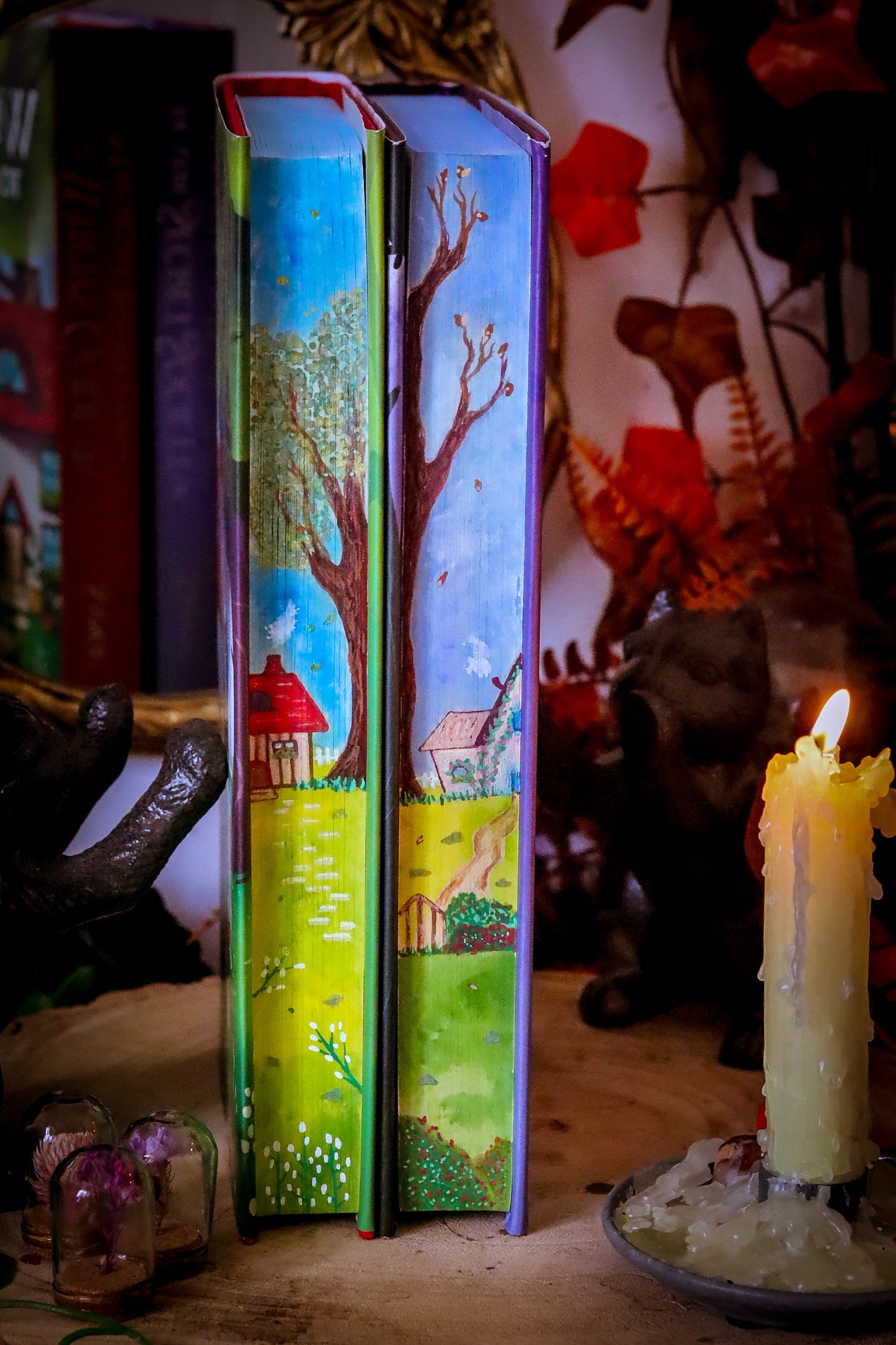 The Very Secret Society of Irregular Witches & A Witch's Guide to Magical Inkeeping hand-painted book edges - books by Sangu Mandana