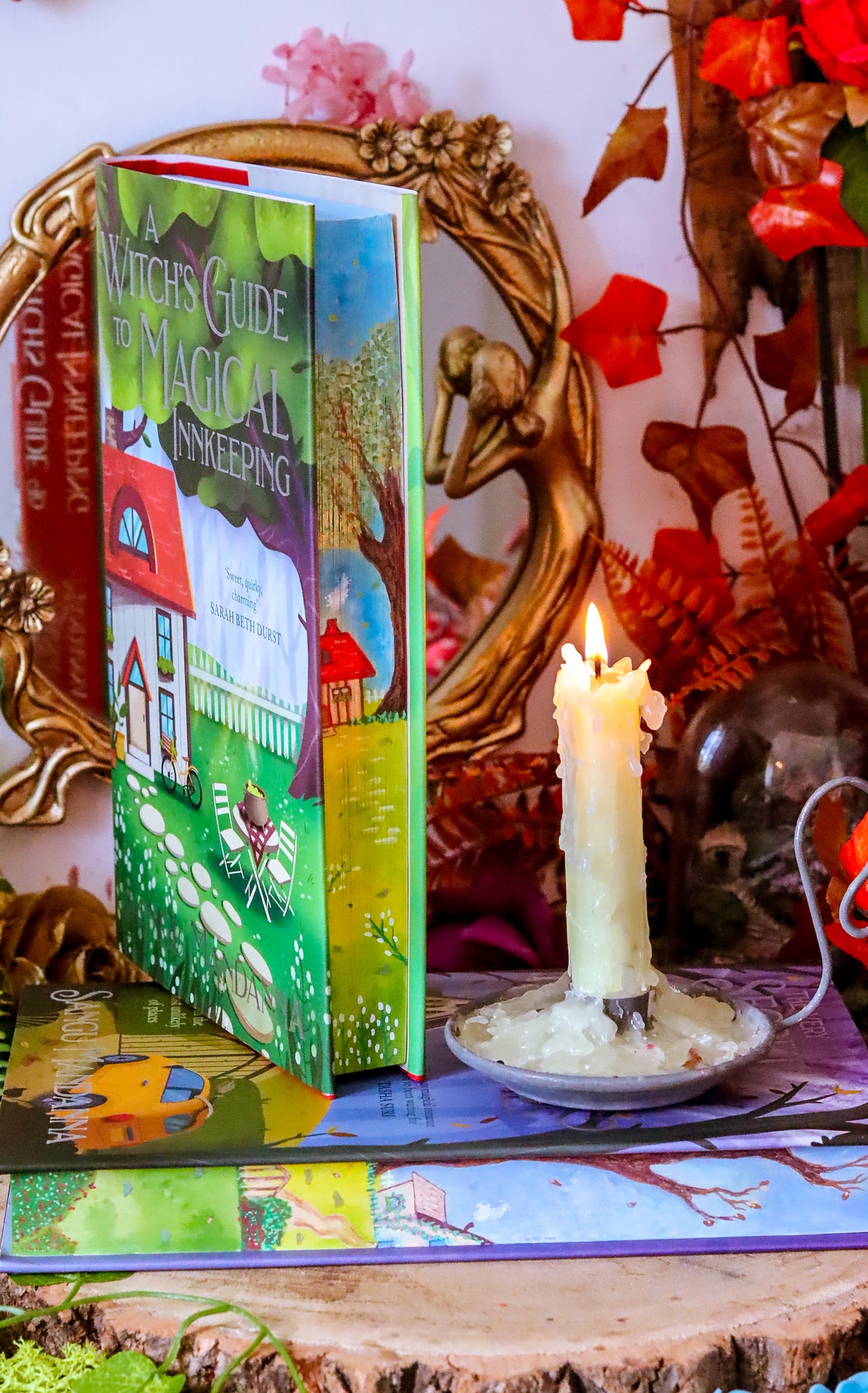 The Very Secret Society of Irregular Witches & A Witch's Guide to Magical Inkeeping hand-painted book edges - books by Sangu Mandana