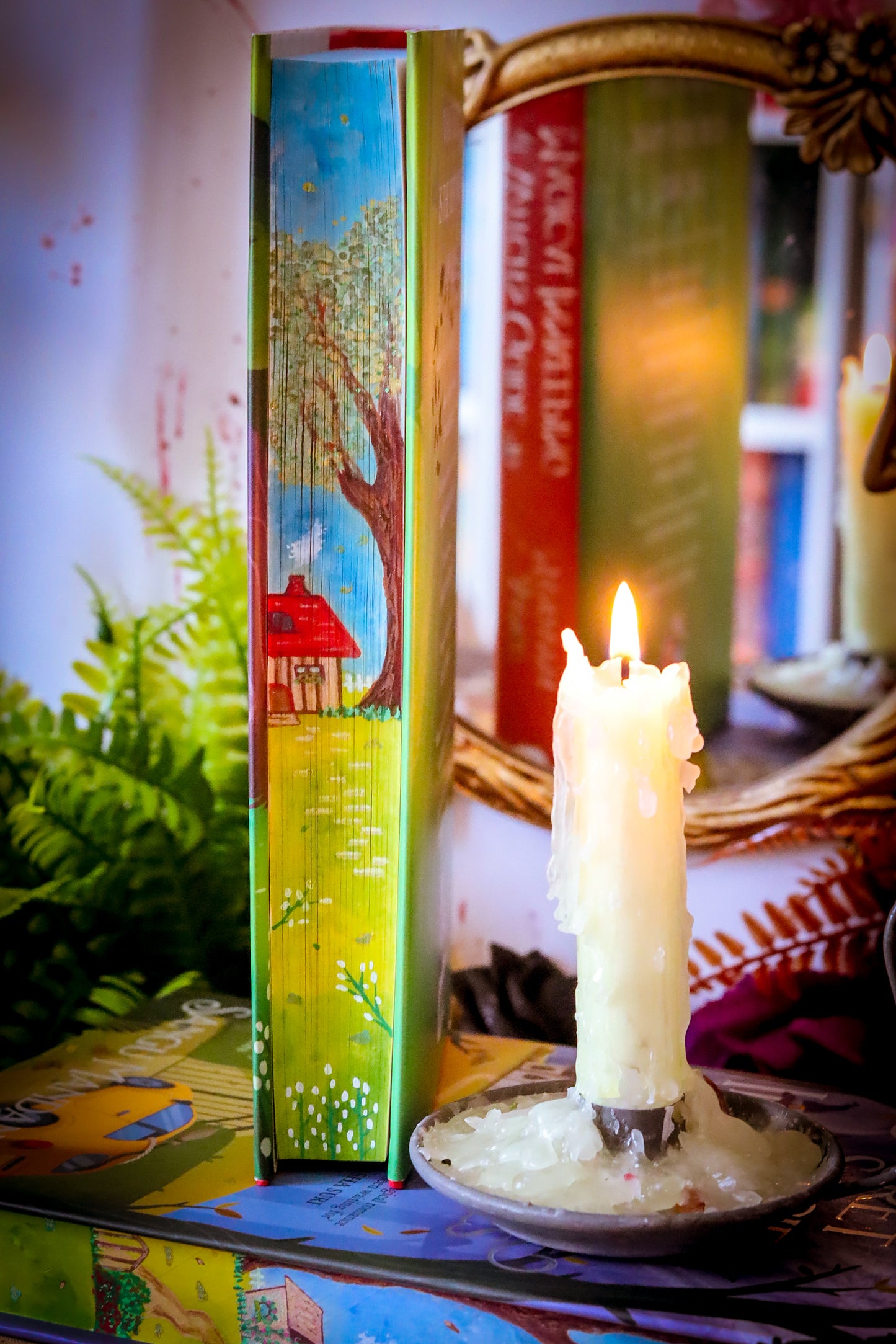 The Very Secret Society of Irregular Witches & A Witch's Guide to Magical Inkeeping hand-painted book edges - books by Sangu Mandana