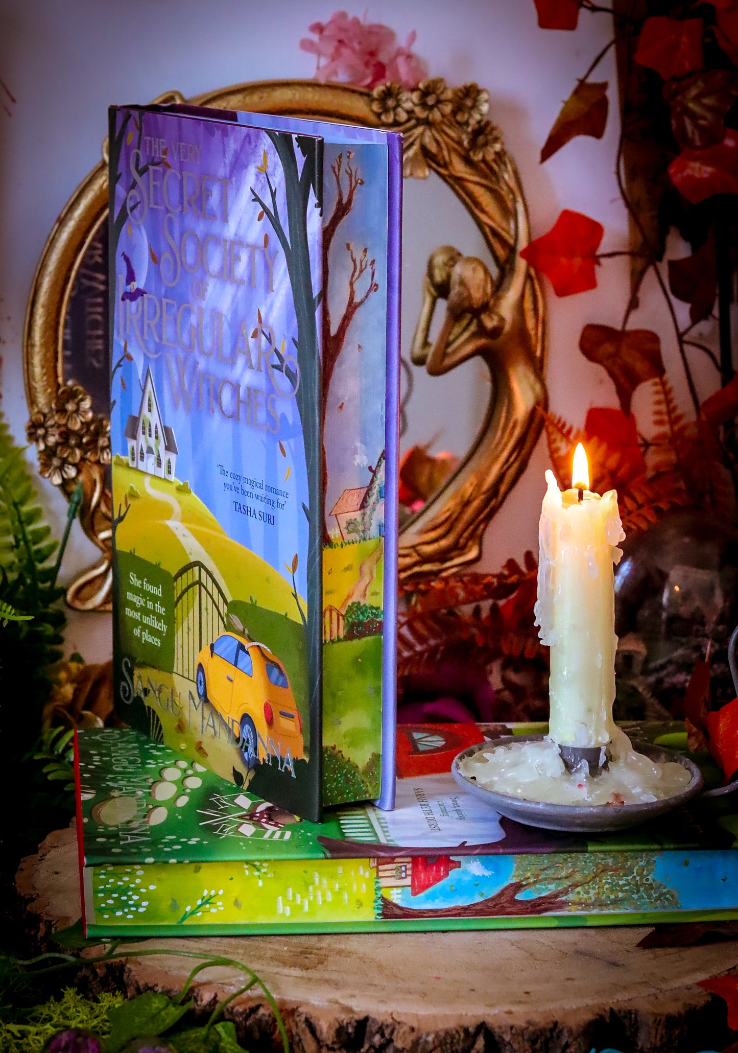 The Very Secret Society of Irregular Witches & A Witch's Guide to Magical Inkeeping hand-painted book edges - books by Sangu Mandana