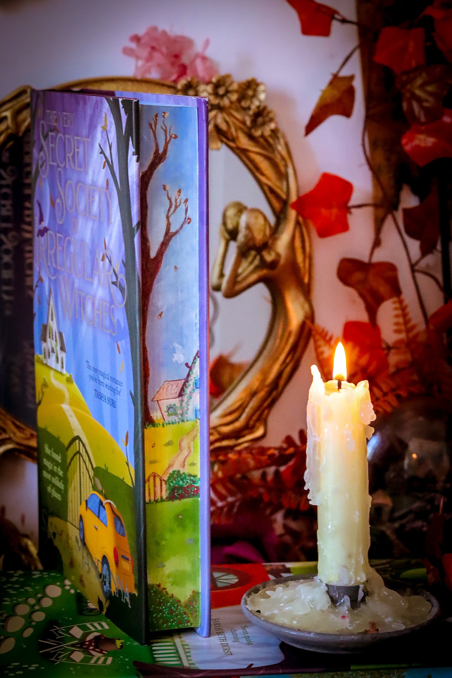 The Very Secret Society of Irregular Witches & A Witch's Guide to Magical Inkeeping hand-painted book edges - books by Sangu Mandana