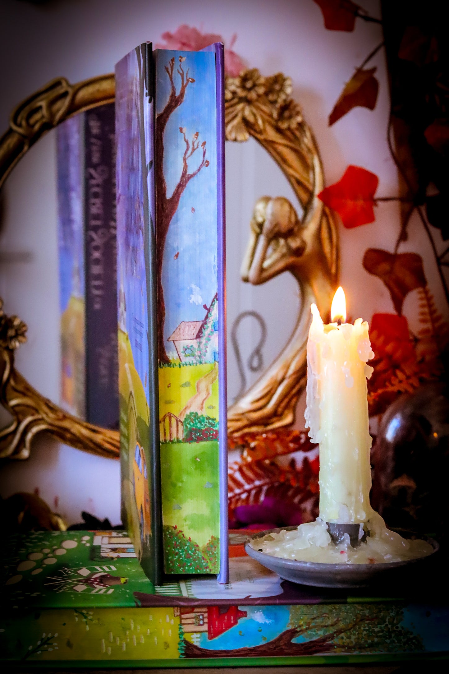 The Very Secret Society of Irregular Witches & A Witch's Guide to Magical Inkeeping hand-painted book edges - books by Sangu Mandana