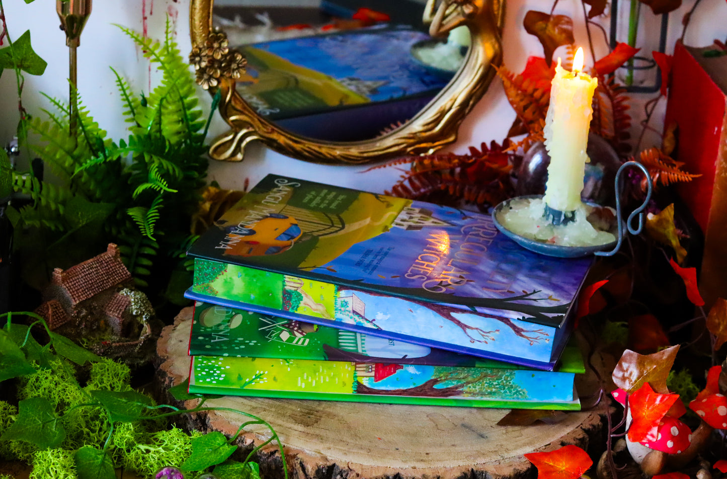 The Very Secret Society of Irregular Witches & A Witch's Guide to Magical Inkeeping hand-painted book edges - books by Sangu Mandana