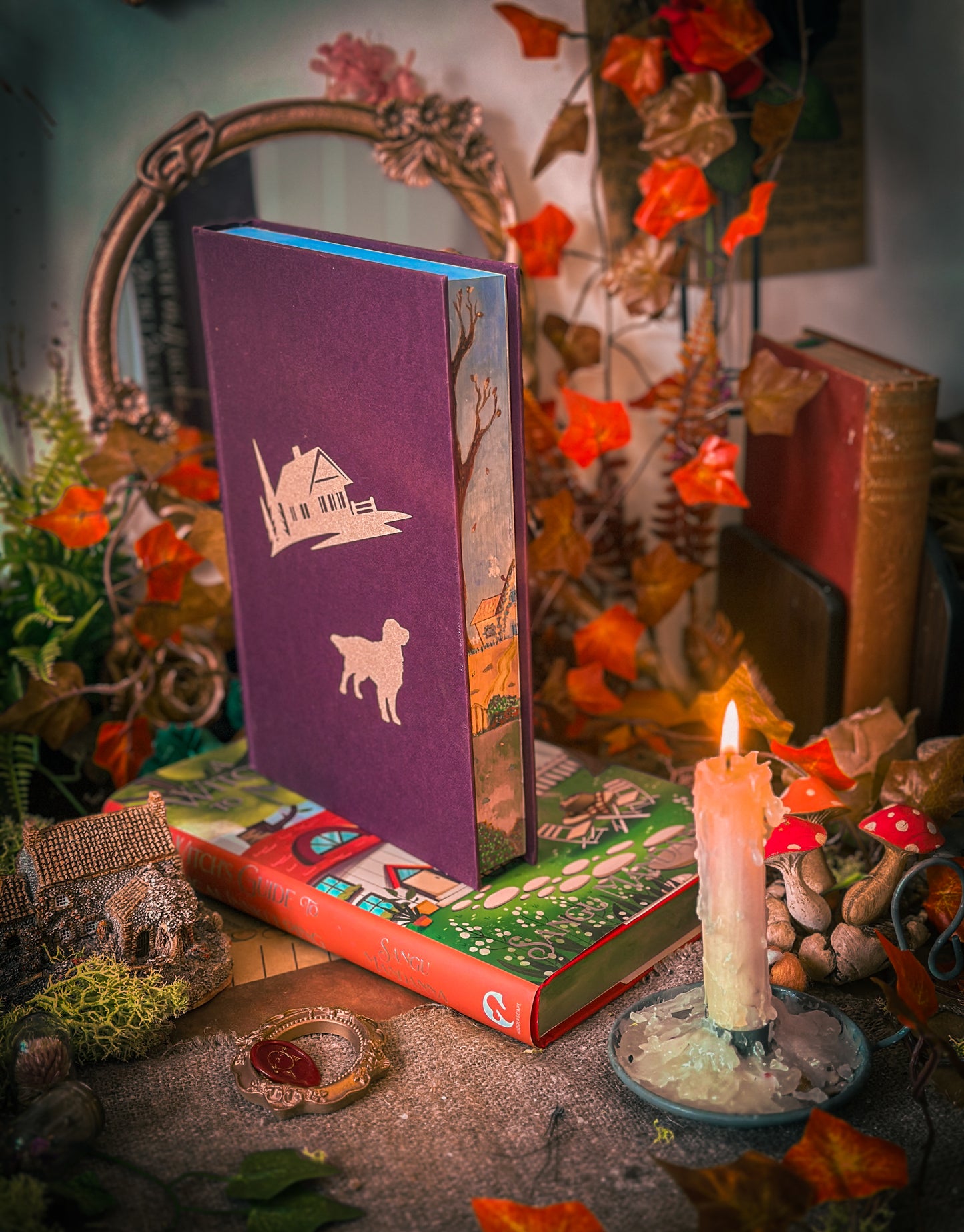 The Very Secret Society of Irregular Witches & A Witch's Guide to Magical Inkeeping hand-painted book edges - books by Sangu Mandana